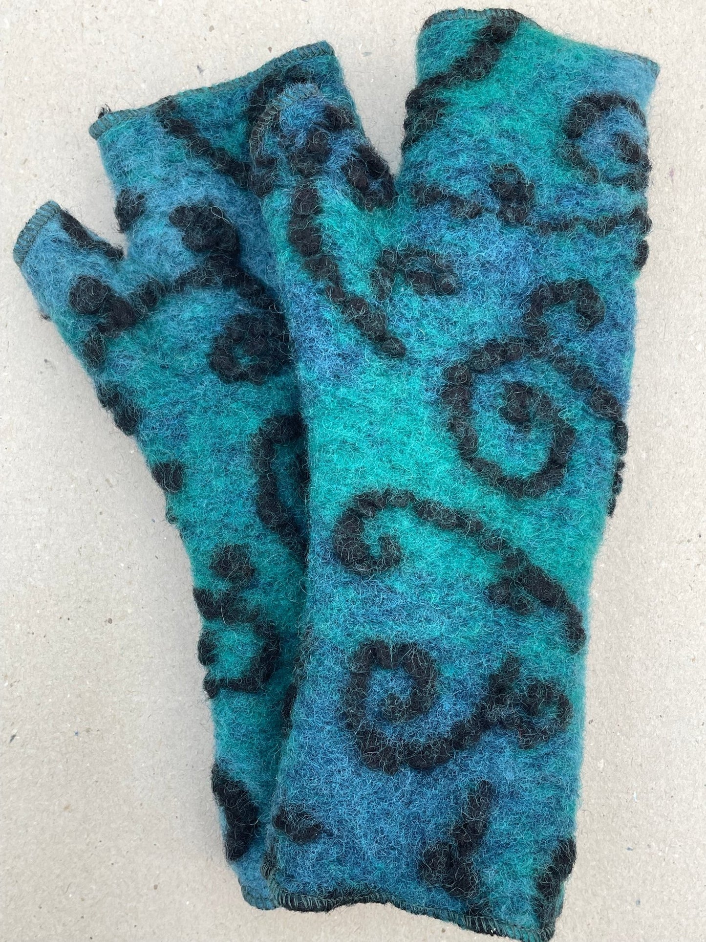 Stulpen Däumlinge Ranken blau-türkis
