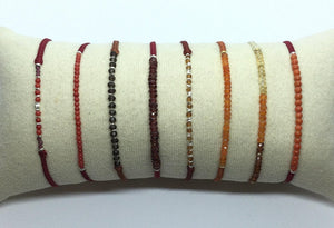 Armbänder von Mona Luna, Rot-,Orange-,Brauntöne